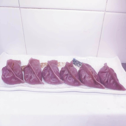 Ravioli di kimchi e maiale